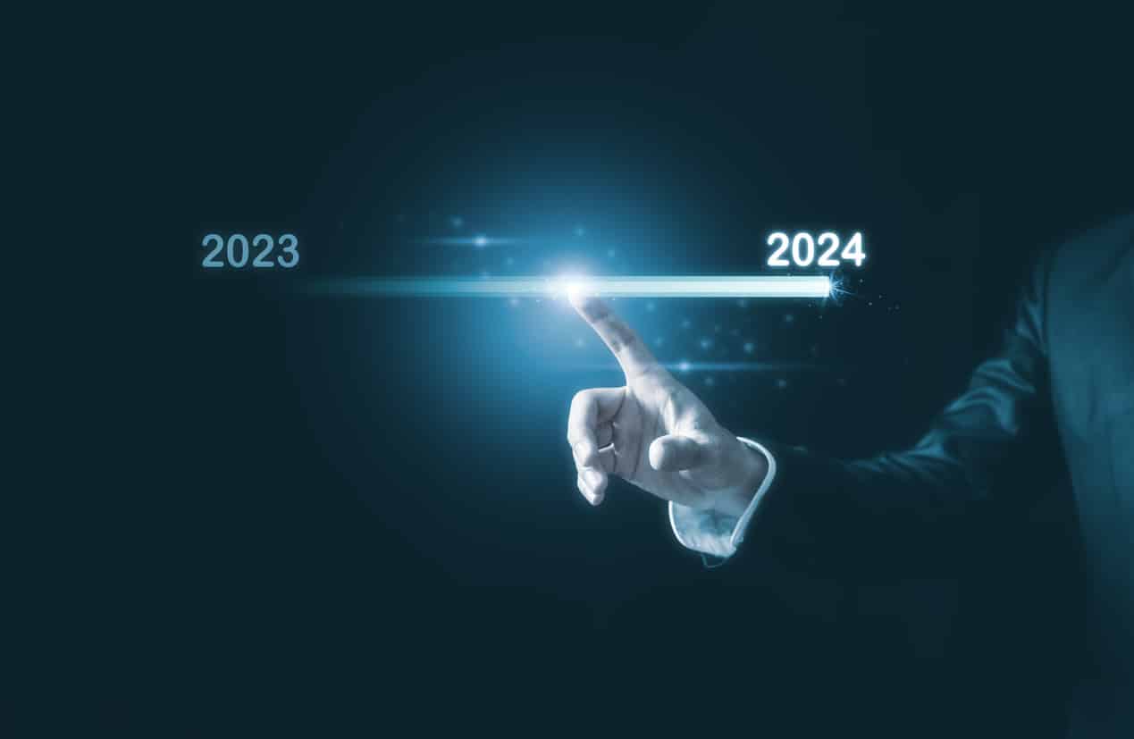 2024 business planning and strategy concept, Hand touching on download bar status to change from 2023 to 2024 for countdown of merry Christmas and happy new year by technology concept, 2024 trend